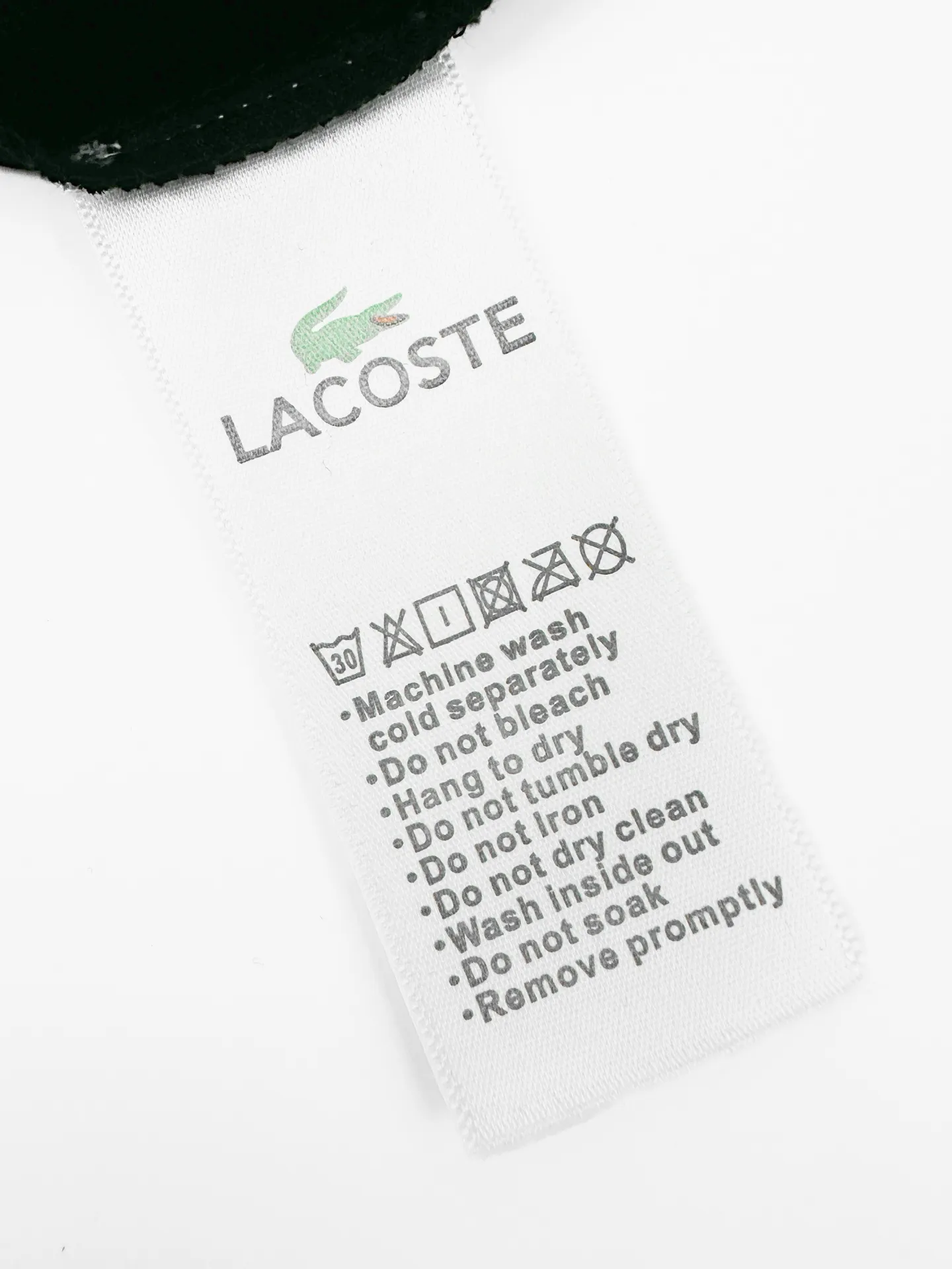 Lacoste Crocodile Logo Polo Shirt Custom Glazed Bee Extract Cotton Delicate and Soft Comfortable Breathable Soft Black with a Breathable Feeling Not Heavy and Unobtrusive Using the Most Calm Tones to Interpret French Relaxation The Iconic Little Crocodile Comes to Your Heart On the Pure Black Canvas, it outlines a low-key edge with a vivid attitude and simplifies the complexities. It uses black as the base and green crocodile as the print to show the texture and brand heritage in a low-key manner. Process 1: Use car seal technology Make independent embroidery chapters through computer embroidery, then position them and sew them to fix them on the clothes. They have a strong three-dimensional effect, are strong and washable, and have stable quality. Process 2: The fabrics have been fermented and washed. They have a better feel and texture. They are not easy to deform, not easy to shrink, not easy to fade, and maintain long-term beauty. Accessories: Customized 1:1 Lacoste crocodile logo Customized 1:1 Lacoste trademark Version: Fitted version Size: S M L XL Style number: CC 968